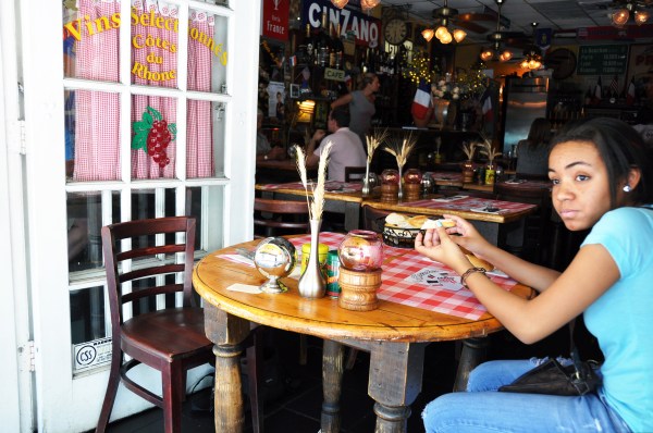 girl sitting at a table