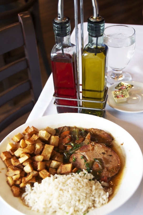  Roasted Veal served with fried potatoes and rice