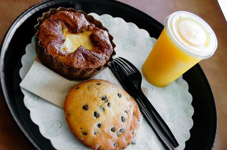 Quiche, chocolate chip cookie, orange juice